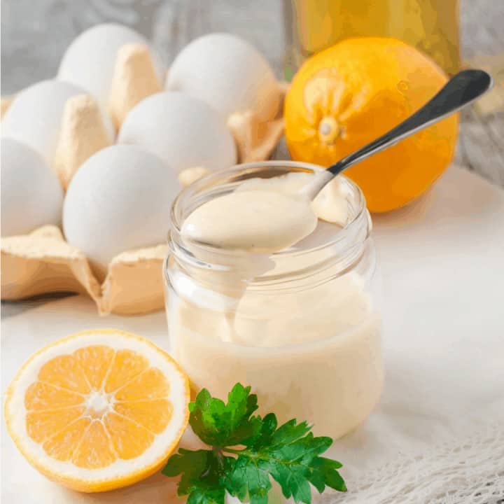 jar of homemade mayonnaise with ingredients