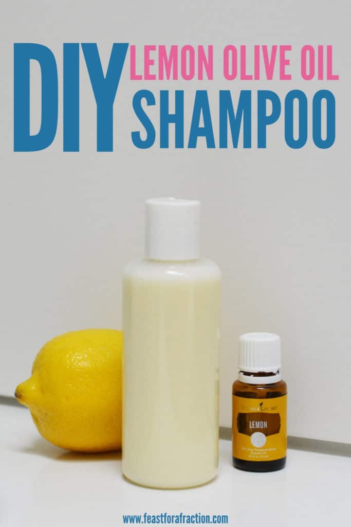 bottle of diy shampoo with whole lemon and bottle of lemon essential oil with title text "DIY Clarifying Shampoo"