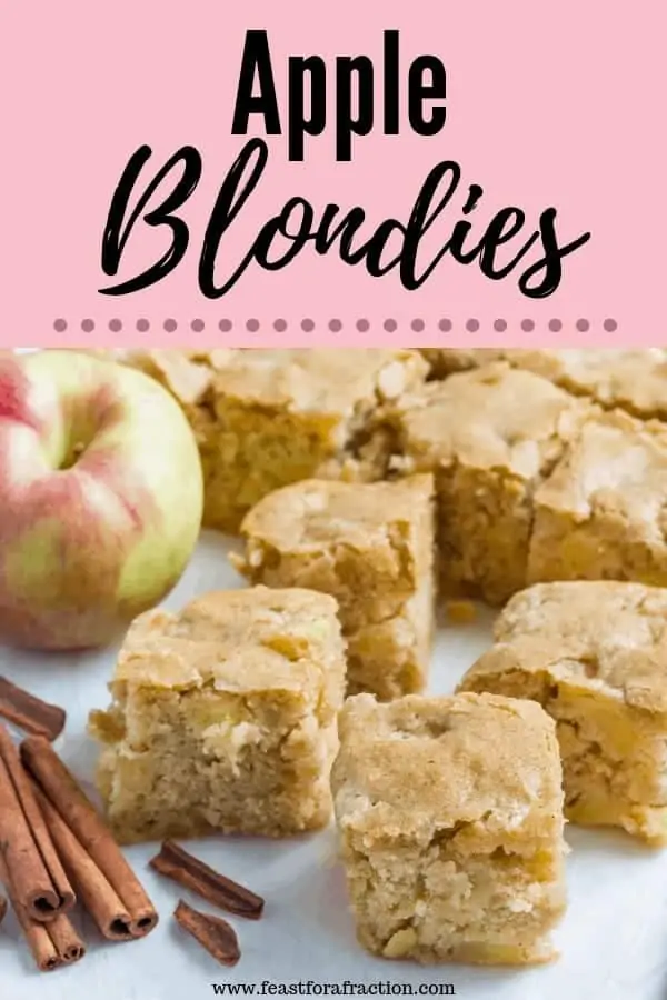 apple blondies with cinnamon sticks and apple on cutting board