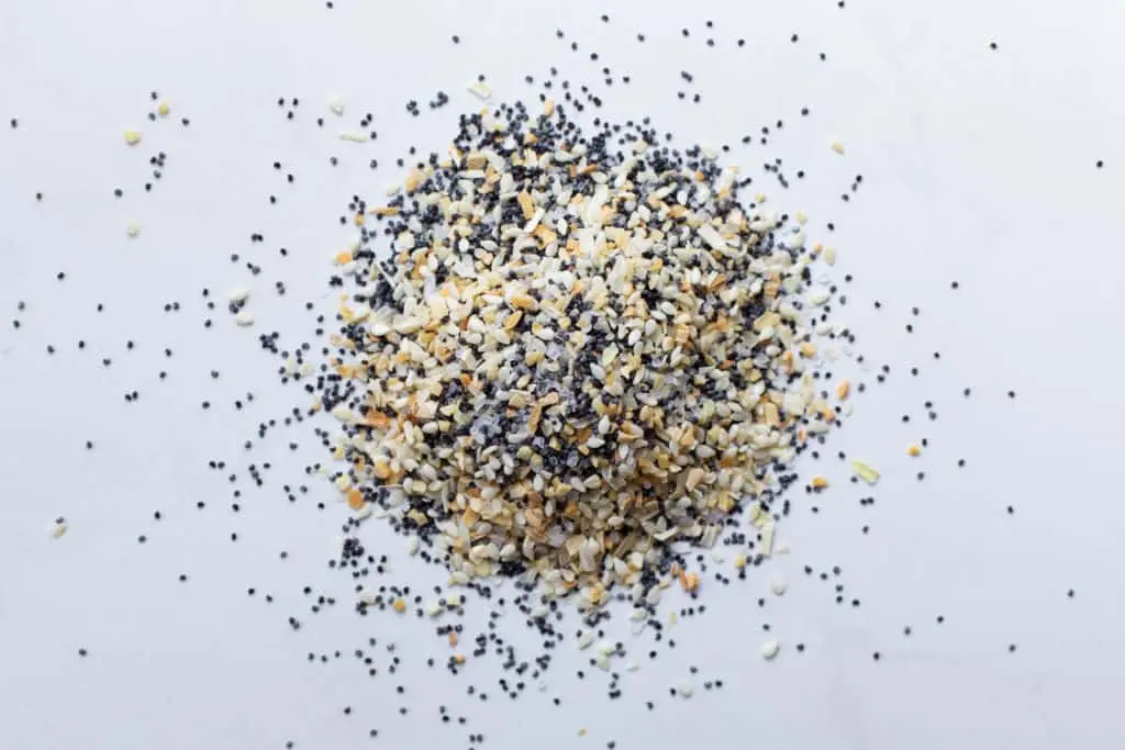 everything bagel seasoning ingredients on a white background