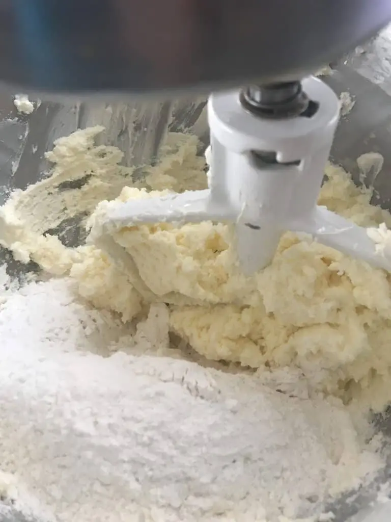 butter, cream cheese and flour in stand mixer with paddle blade
