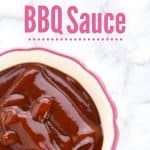 homemade bbq sauce in white bowl with pink trim on marble counter with title text "homemade bbq sauce"
