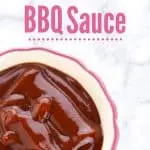 homemade bbq sauce in white bowl with pink trim on marble counter with title text "homemade bbq sauce"
