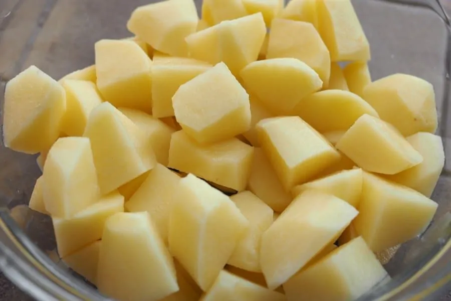 glass bowl filled with diced potates