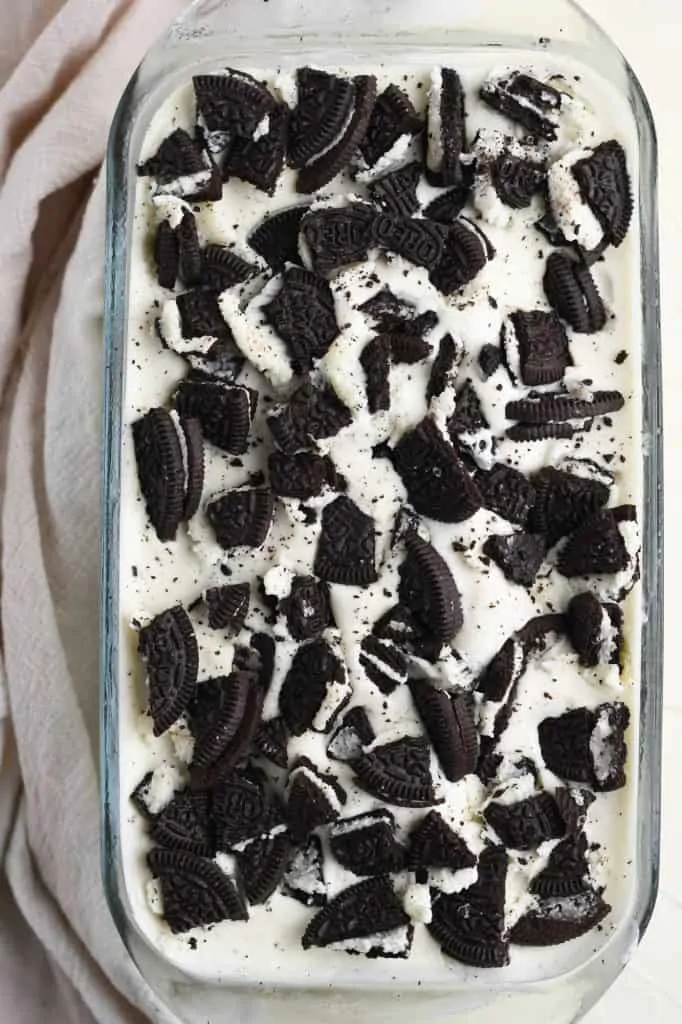 overhead of no churn ice cream sprinkled with chopped oreo cookies