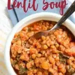instant pot lentil soup in white bowl with title text "Instant Pot Lentil Soup"