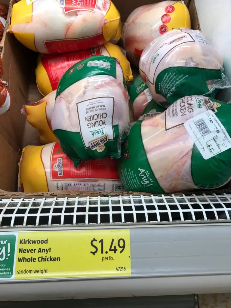 whole packaged chickens at grocery store