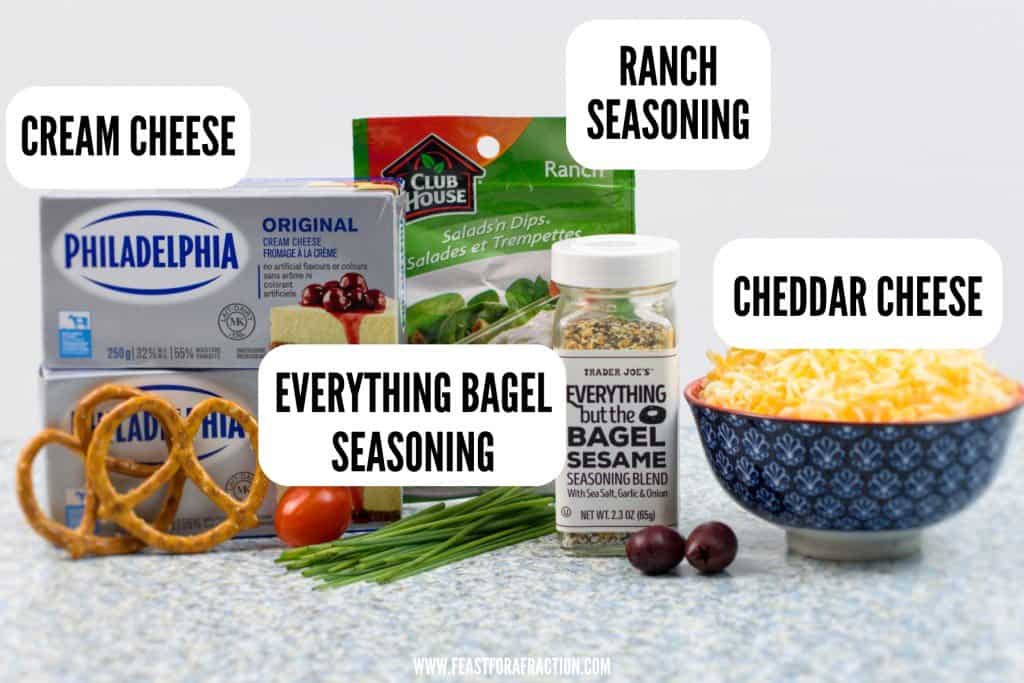 INGREDIENTS FOR EVERYTHING BAGEL CHEESE BALL: CREAM CHEESE, RANCH SEASONING, CHEDDAR CHEESE, EVERYTHING BAGEL SEASONING