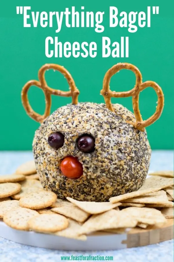 everything bagel cheese ball with title text decorated to look like a reindeer