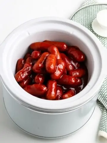 overhead image of bbq little smokies in white crockpot