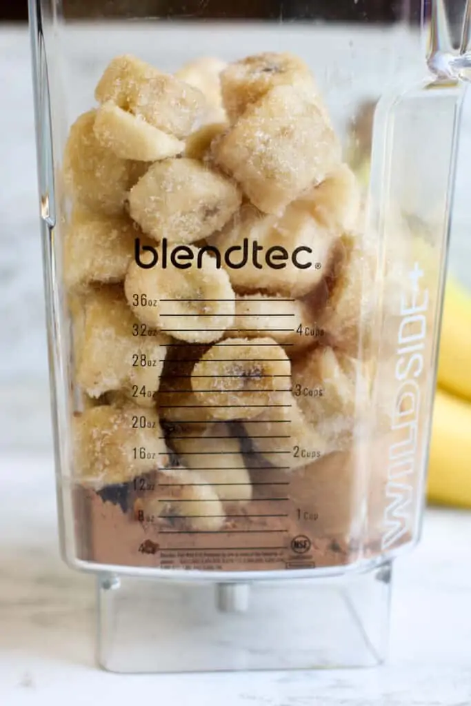 frozen bananas and cocoa powder in a blendtec blender