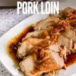 slow cooker pork loin sliced on white plate with crockpot in background with title text