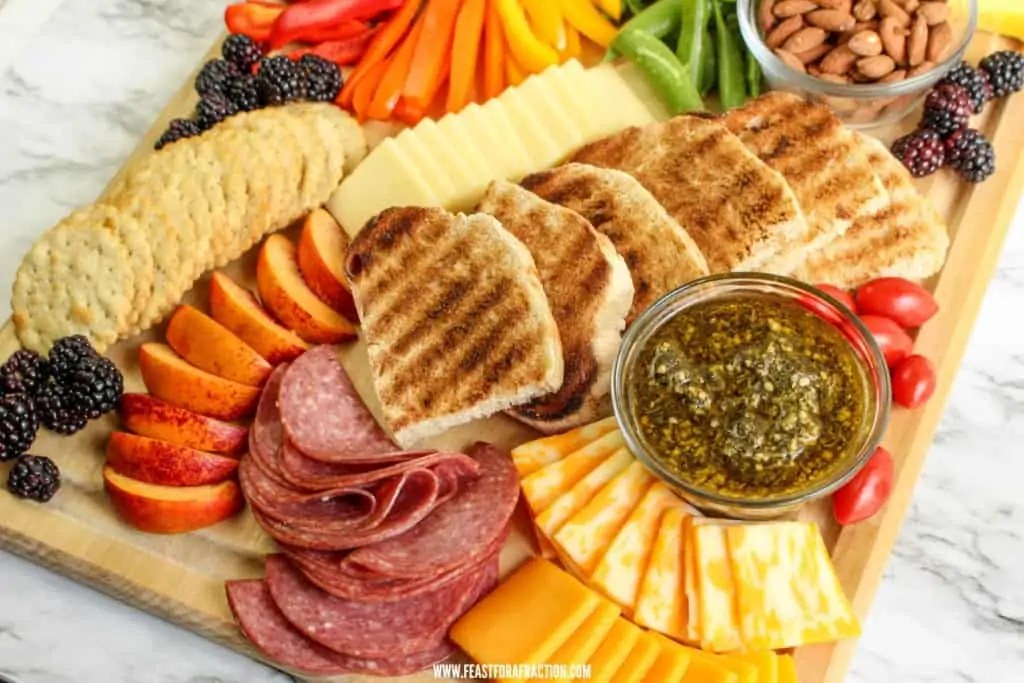 horizontal image of charcuterie board with budget ingredients
