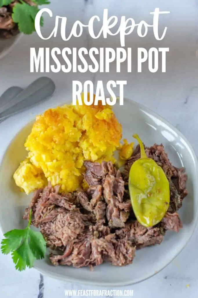 shredded mississippi roast on white plate with title text "Crockpot Mississippi Pot Roast"