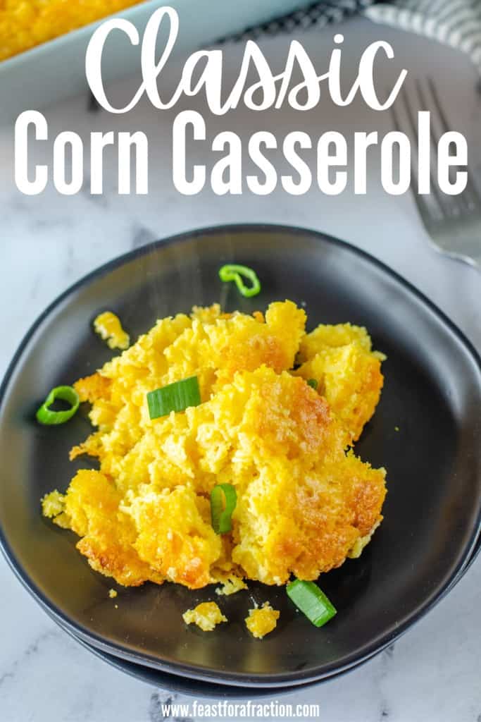 corn casserole on black plate with title text