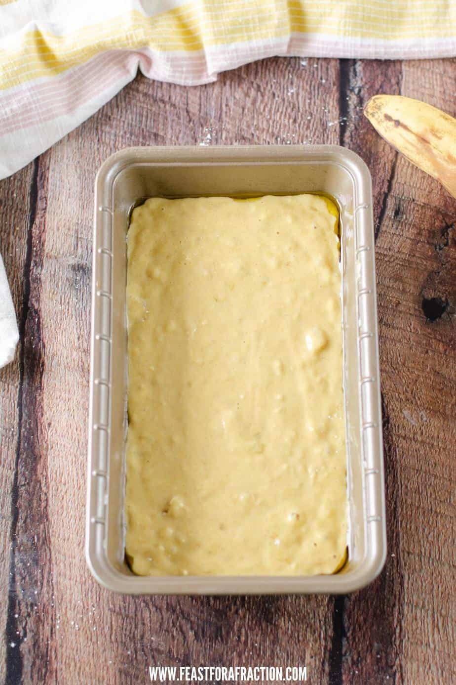 applesauce banana bread batter in bread pan