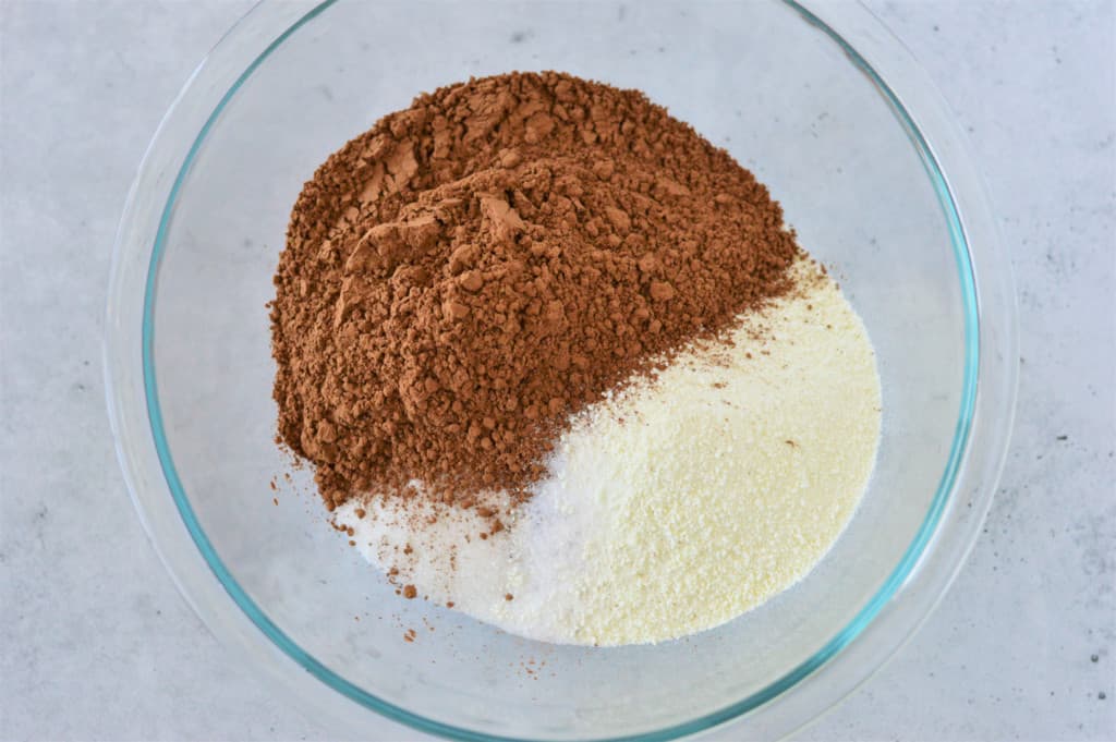 sugar, milk powder, salt and cocoa powder in a glass bowl