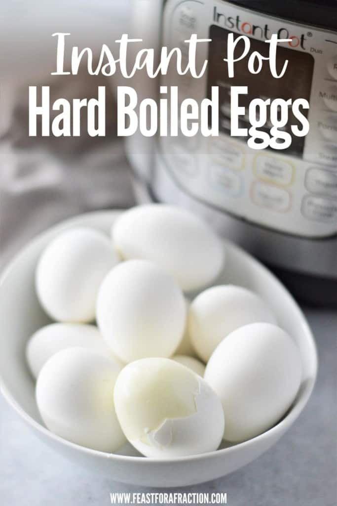 hard boiled eggs in a white bowl with instant pot in the background with title text "Instant Pot Hard Boiled Eggs"