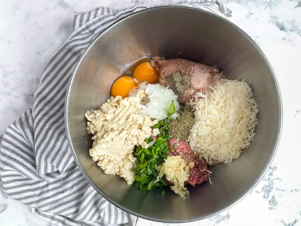 homemade meatball ingredients in a mixing bowl