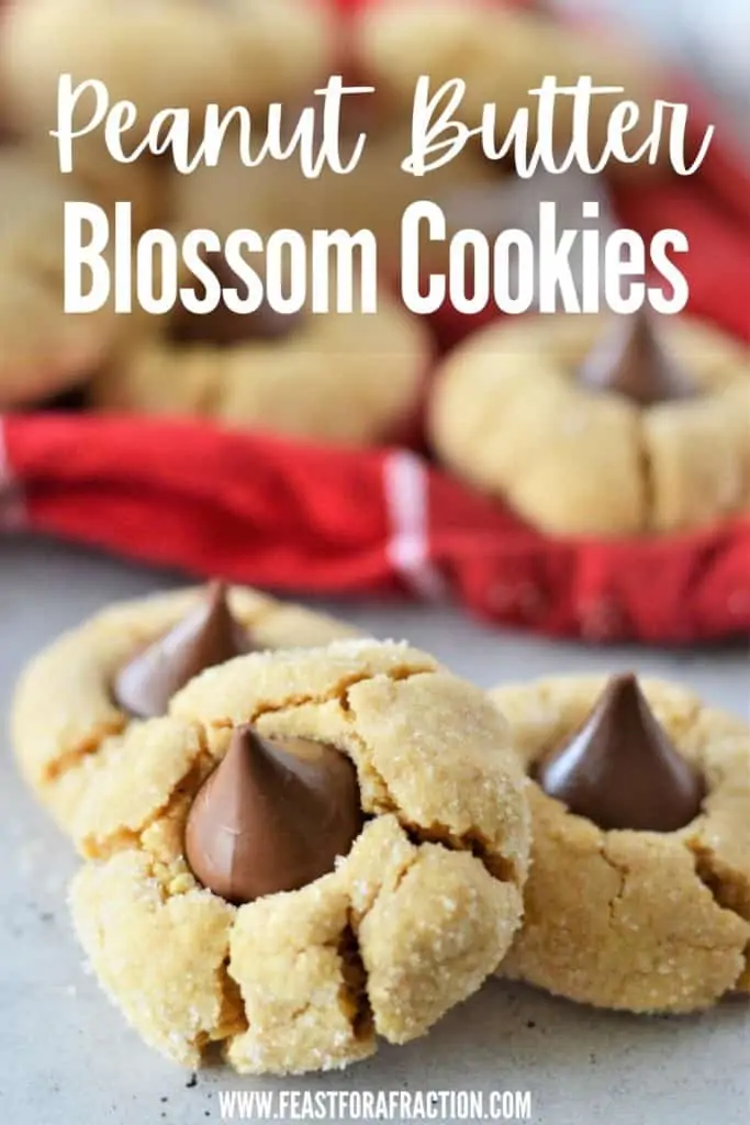 peanut butter blossoms stacked on counter with title text