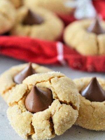 peanut butter hershey kiss cookies with red cloth napkin