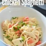bowl of chicken spaghetti with instant pot in background with title text