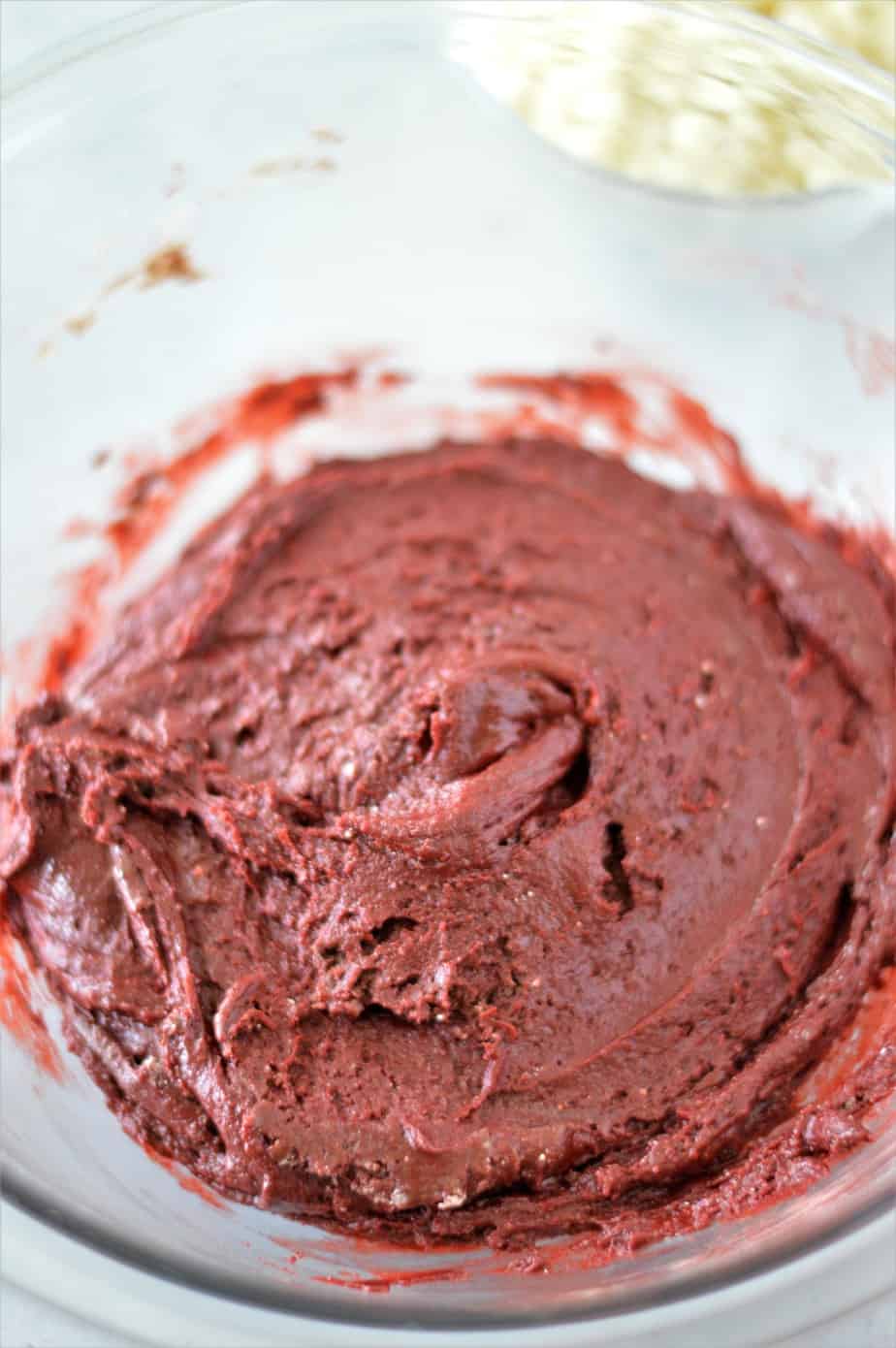 red velvet cake mix cookie dough in glass bowl