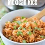 white bowl of Instant Pot Mexican Rice with wooden spoon and instant pot in background with title text