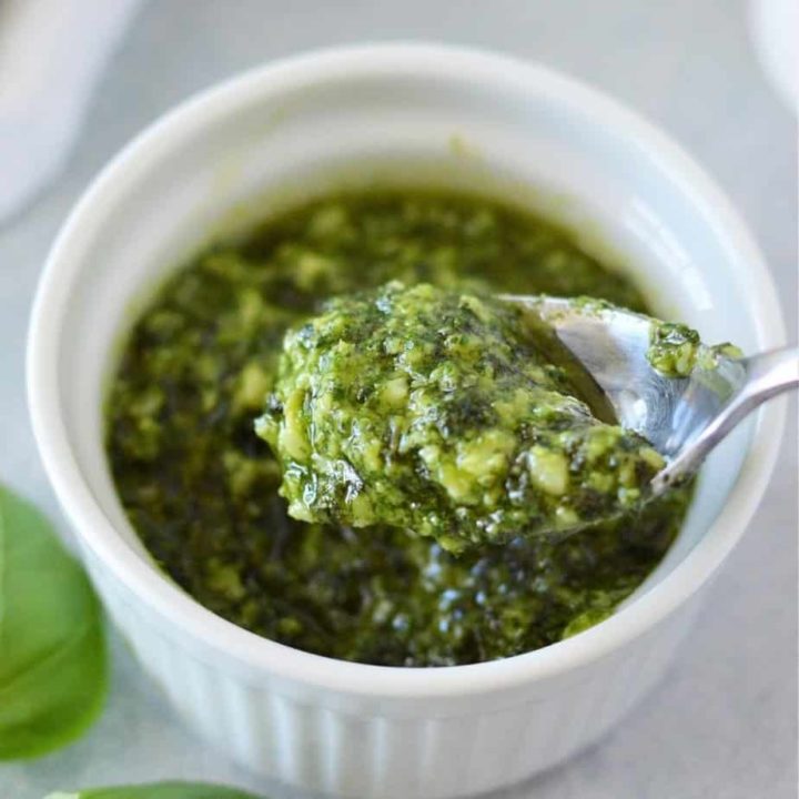 spoon of homemade pesto recipe without pine nuts