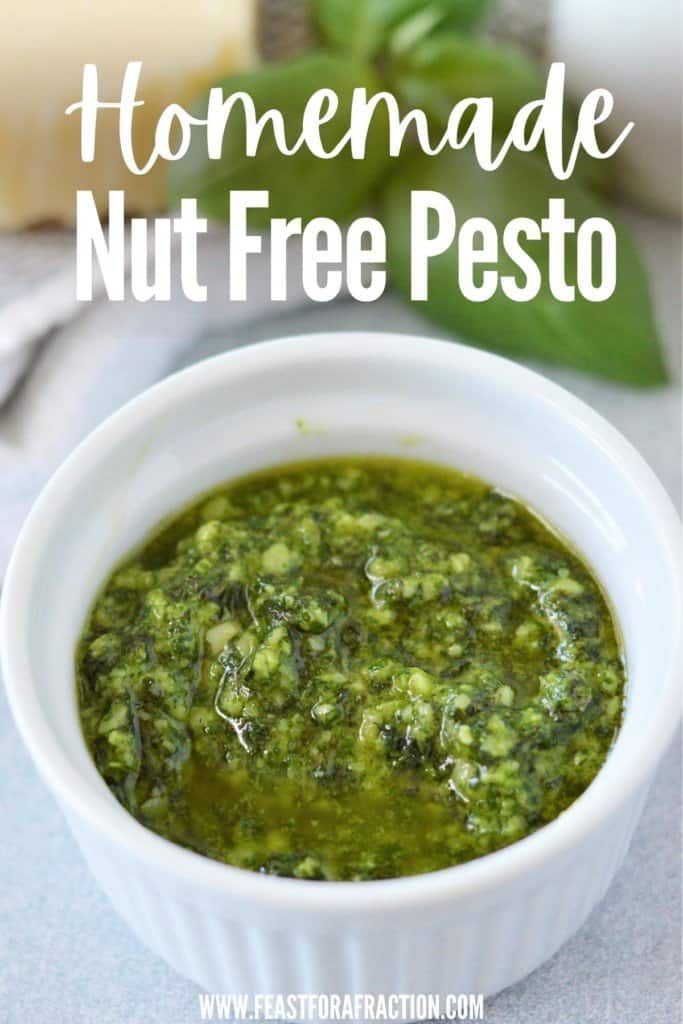 homemade pesto without pine nuts in ramekin with fresh basil in background and title text