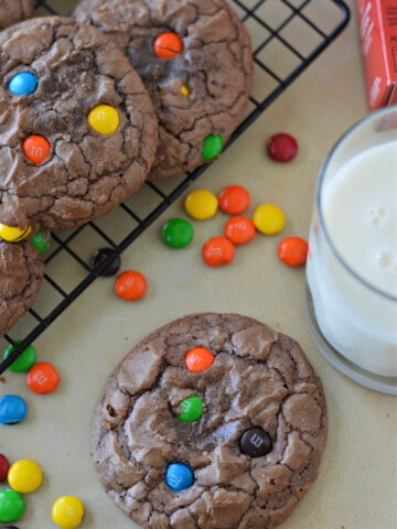 brownie mix cookies on wire rack with glass of milk