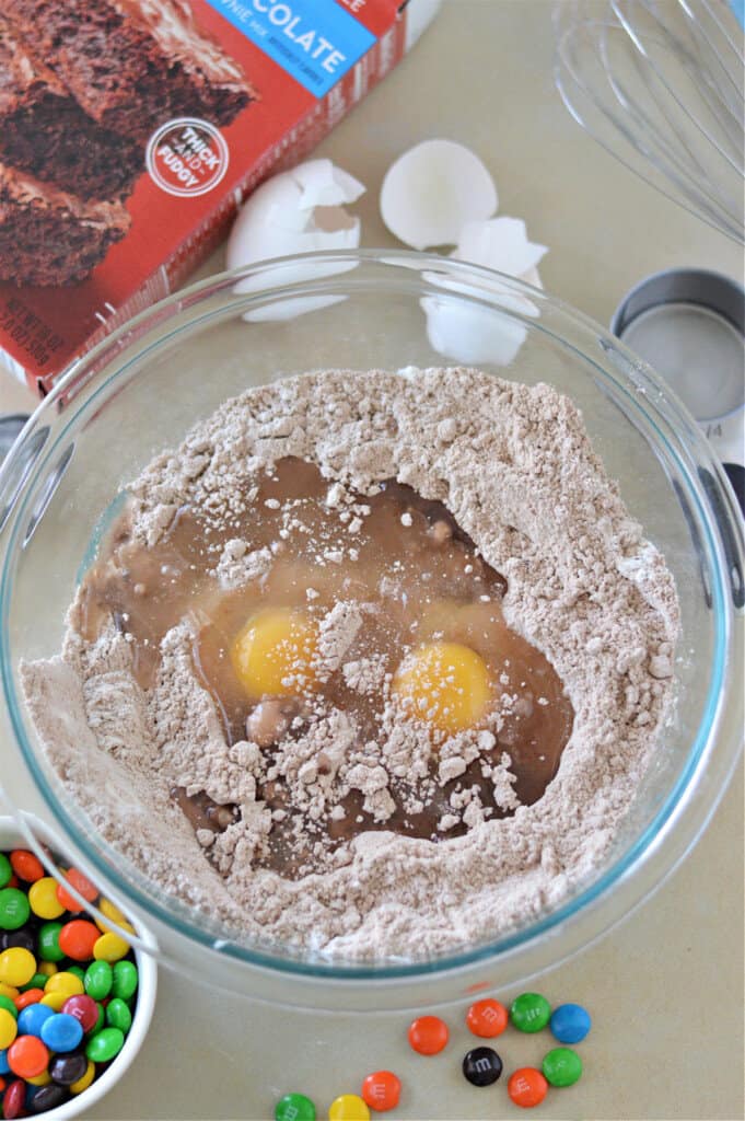 eggs in glass bowl with brownie mix