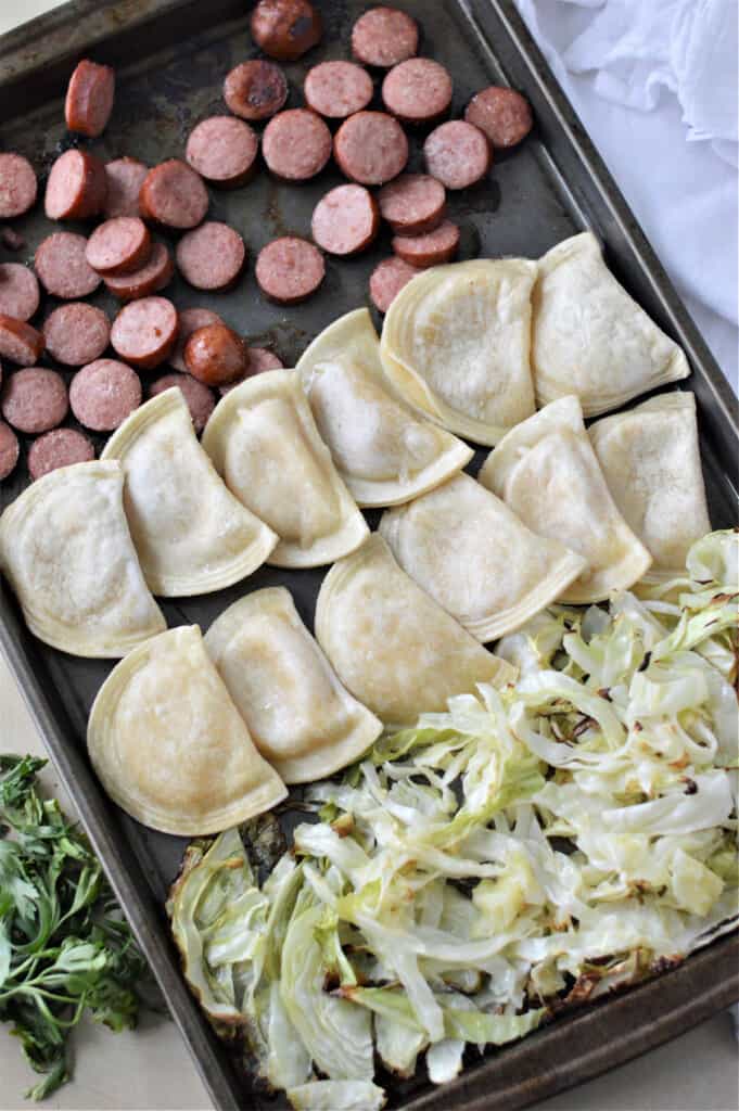 pierogi, cabbage and sausage cooked on sheet pan