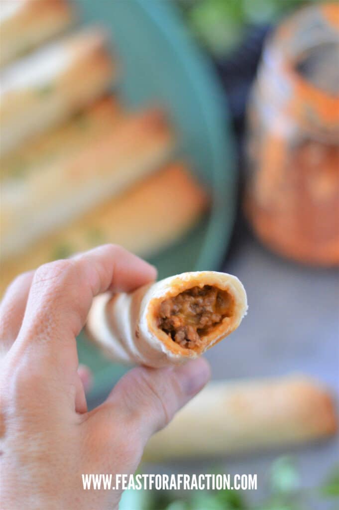bite out of beef enchilada taquitos