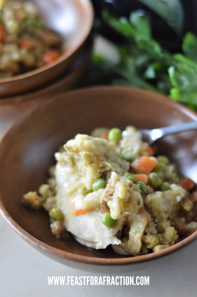 bowl of crock pot chicken and stuffing