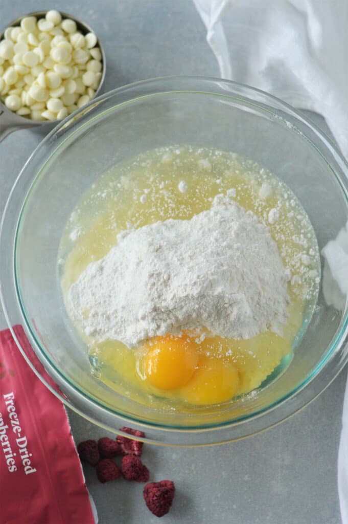 cake mix, eggs, and vegetable oil in glass bowl