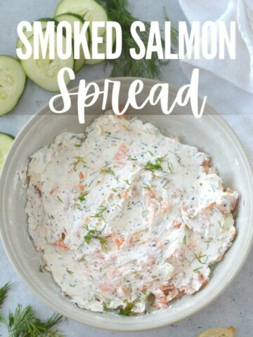 Smoked salmon spread in a bowl with cucumbers.