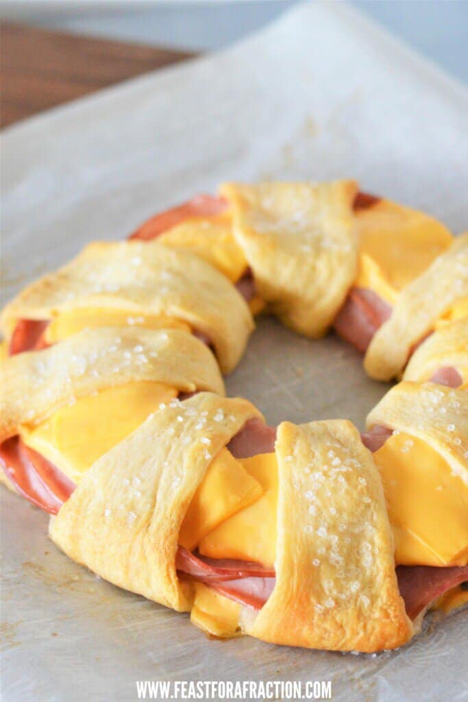 baked ham and cheese ring on parchment paper