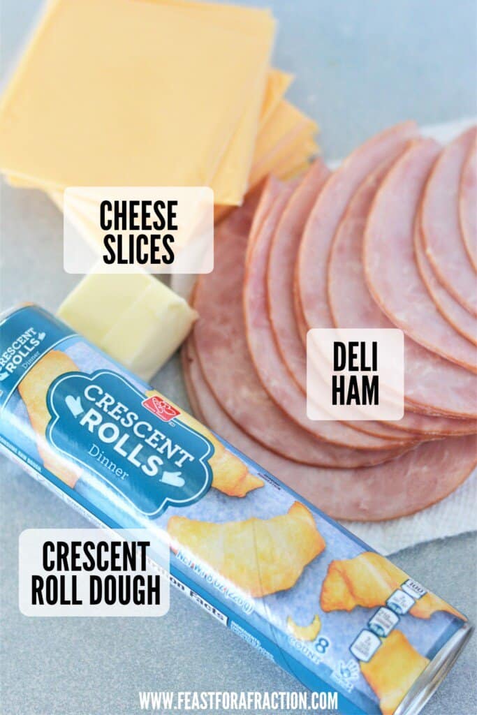 ingredients for ham and cheese ring: crescent roll dough, ham slices, American cheese, and optional butter