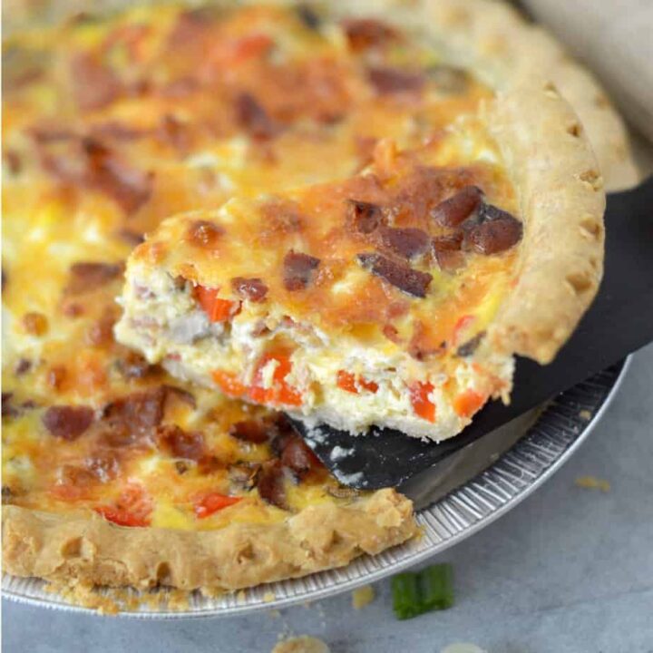 square image of slice of quiche being lifted out of pie pan