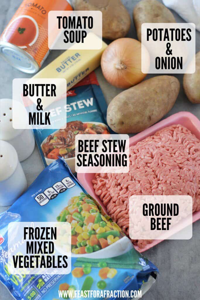 ingredients for shepherd's pie: tomato soup, potatoes, onions, butter, milk, beef stew seasoning, frozen mixed vegetables and ground beef