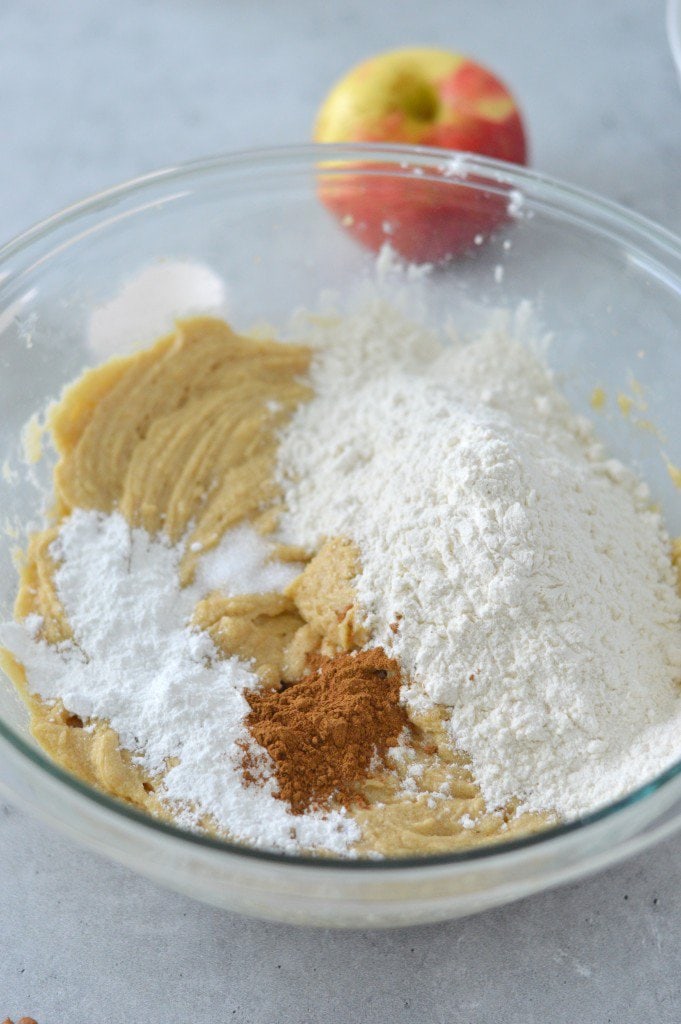 A bowl with flour, sugar, and cinnamon in it.