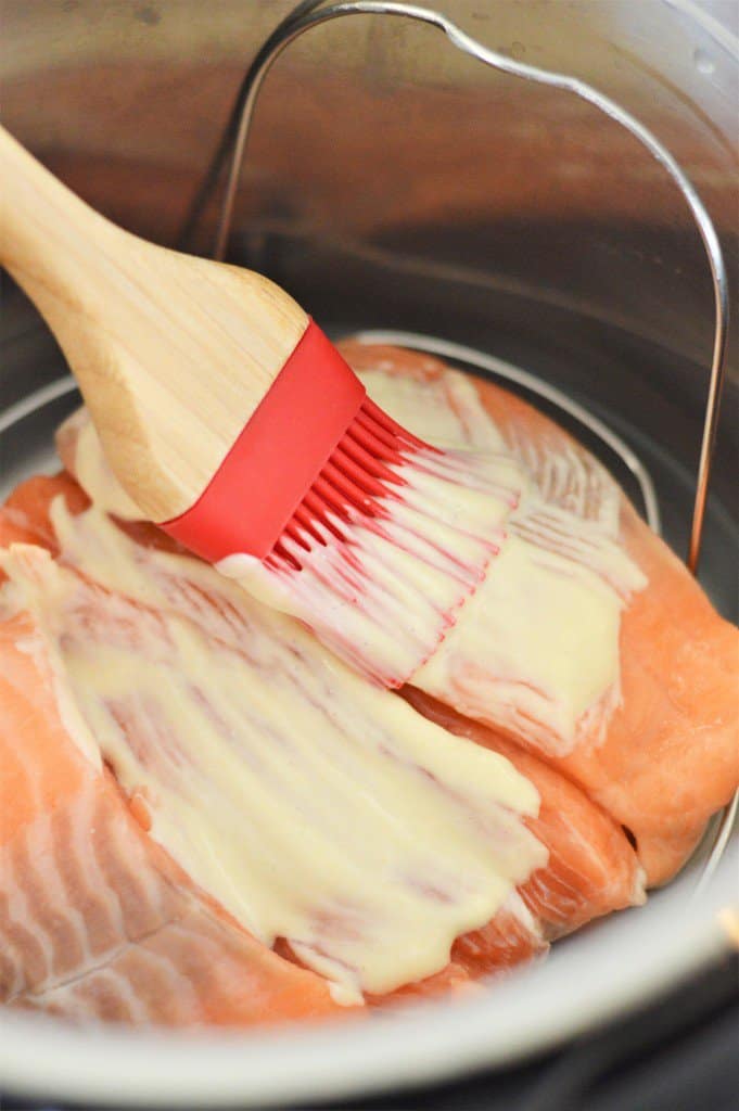 Salmon fillets being cooked in an instant pot.