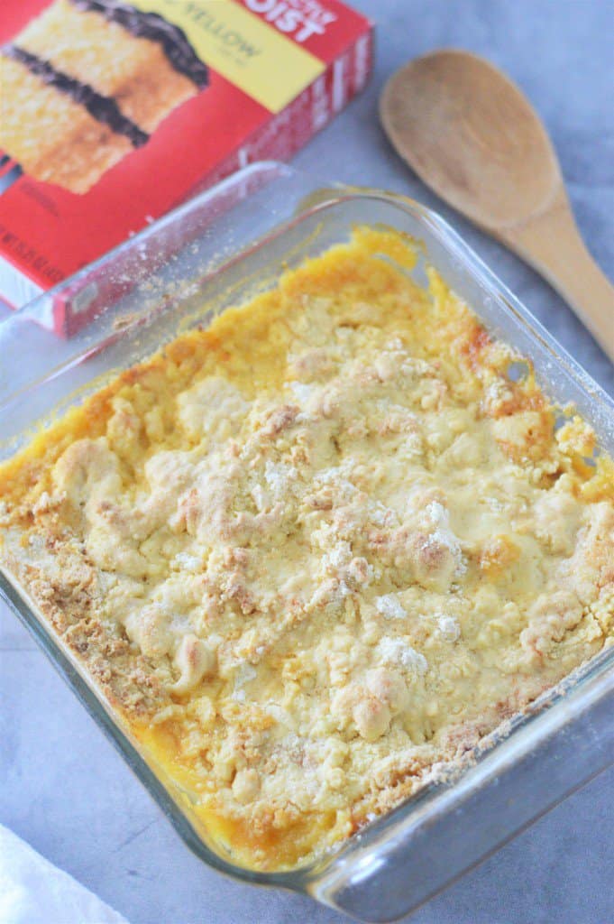 melted butter poured on top of cake mix and canned peaches