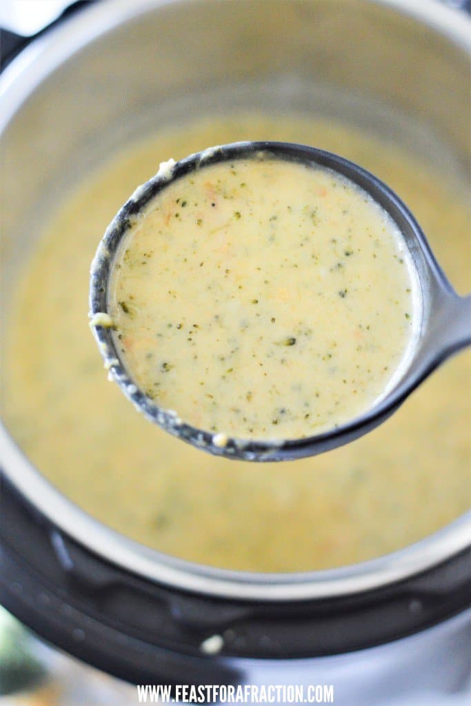 A ladle full of broccoli soup in an instant pot.