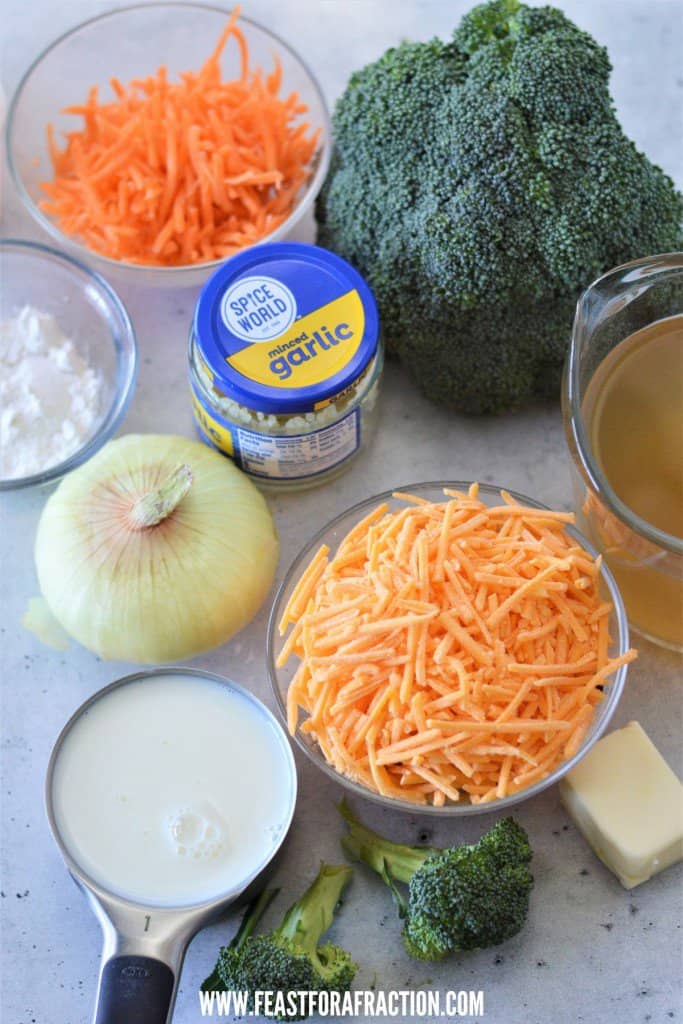 ingredients for broccoli cheddar soup: carrots, broccoli, vegetable broth, shredded cheese, butter, milk, onion, flour