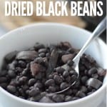 black beans in white bowl with spoon and title text