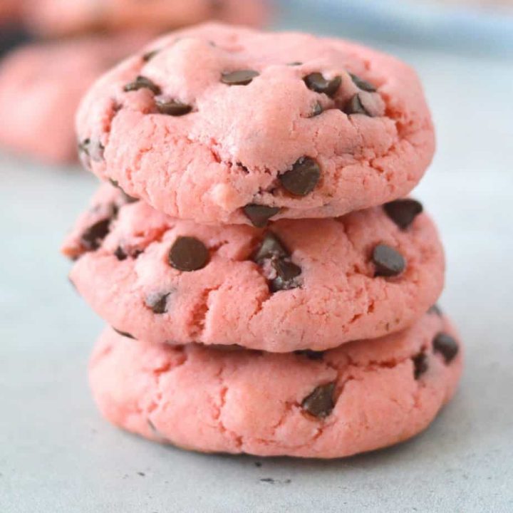 strawberry chocolate chip cookies stacked on top of each other.