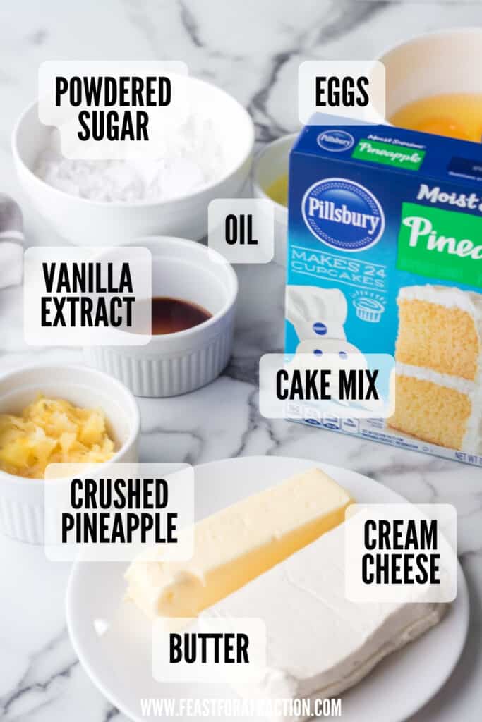 Ingredients for baking displayed on a kitchen counter, labeled with their names.